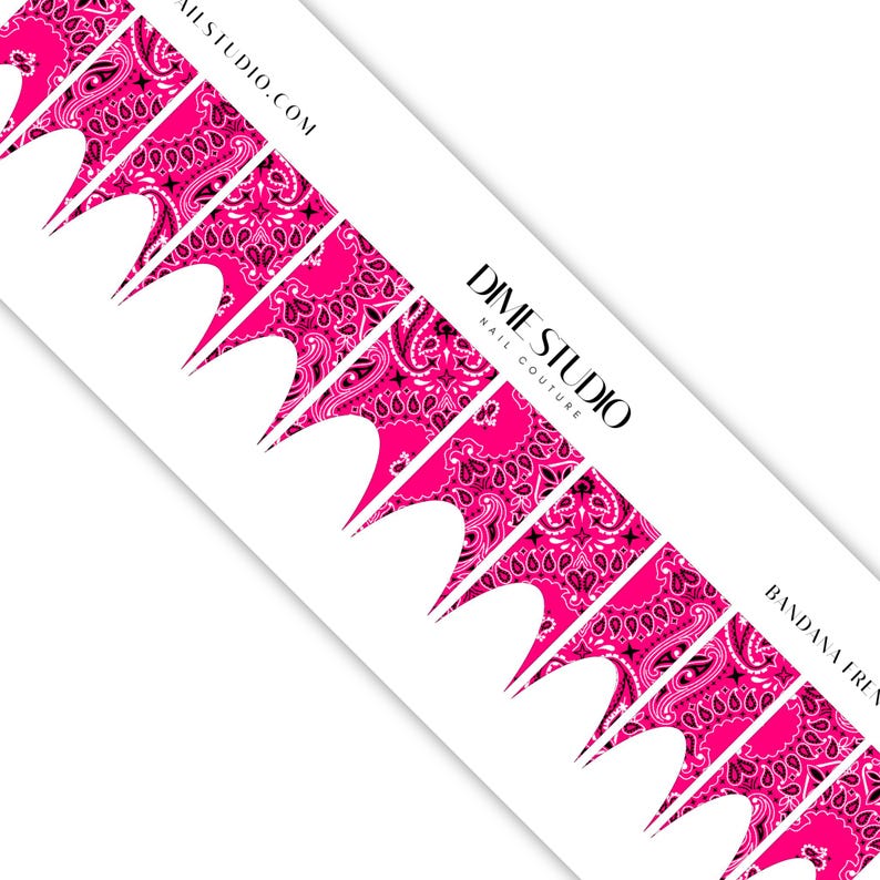 May include: Pink and black paisley patterned nail wraps with the text "DIME STUDIO NAIL COUTURE" and "BANDANA TREND" on a white background.