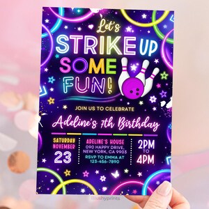 May include: Neon pink, blue, and green glow-in-the-dark birthday party invitation with the text "Let's Strike Up Some Fun!" and "Adeline's 7th Birthday". The invitation includes a bowling ball and pins, stars, and neon circles. The invitation details include the date, time, and location of the party.