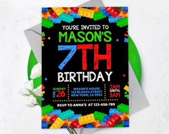 May include: A black birthday invitation with colorful building blocks around the edges. The text reads "YOU'RE INVITED TO MASON'S 7TH BIRTHDAY" in green, blue, and red. Details include the date, time, and RSVP information.