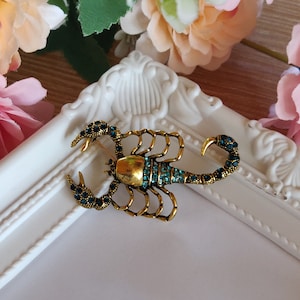 Sparkling Sea Blue Scorpion Brooch – A Dazzling Statement Piece