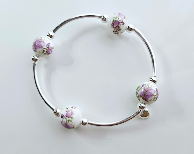 Truly Blessed, count those blessings bracelet with white porcelain beads with hand painted lavender floral design and silver heart charm.