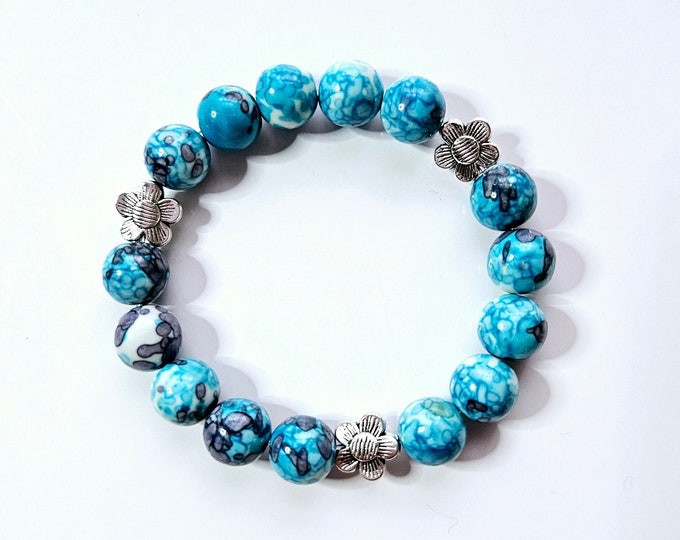 Sky blue, navy and white rain flower jade bracelet with silver flower beads.