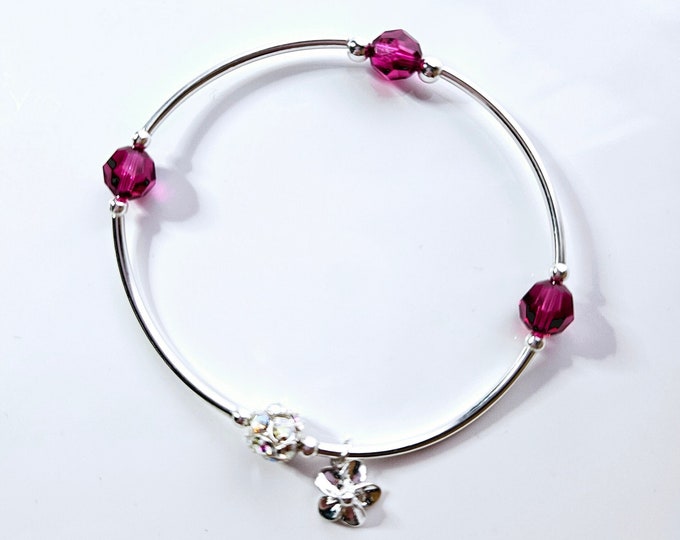 Truly Blessed,count your blessings bracelet with ruby birthstone and silver charm for July birthday.