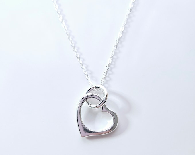 Sterling silver Heart pendant necklace on silver cable chain.