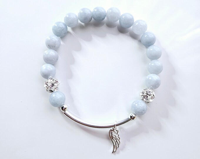 Silver Angel wing charm bracelet with angelite gemstone beads, rhinestine pave beads and sterling silver beads.