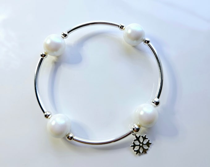 Truly Blessed, count those blessings bracelet with white pearlescent pearls, sterling silver beads and snowflake charm.