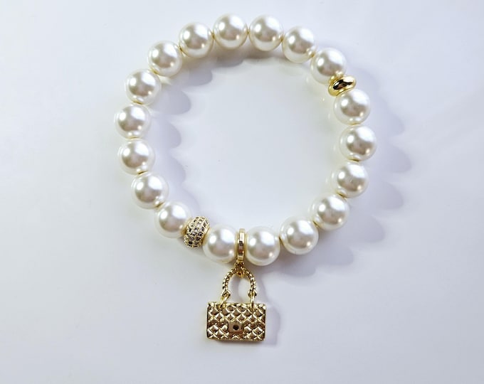 Handbag charm bracelet with Austrian crystal white pearls and 18kt gold handbag charm