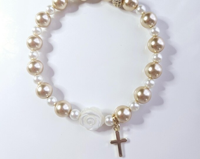 Gold pearl bracelet with mother of pearl flower and gold filled cross charm