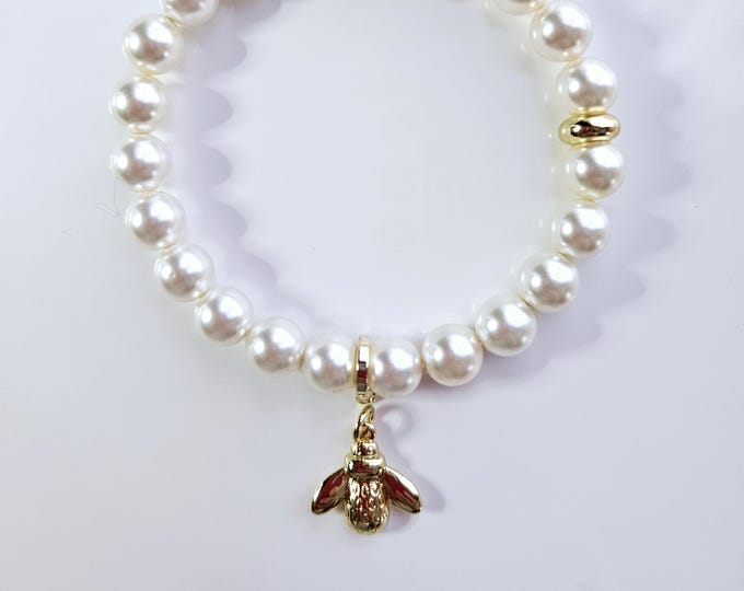 14kt gold filled bumblebee charm bracelet with white Austrian crystal pearls.