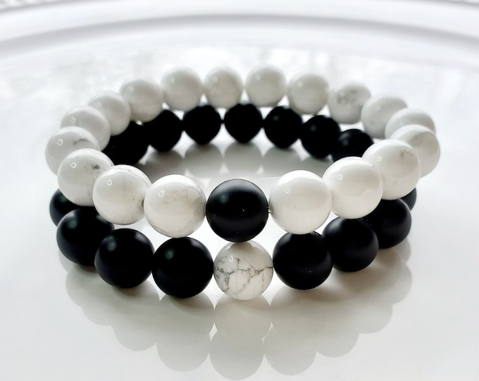 Black onyx and white how lite couples' bracelet set