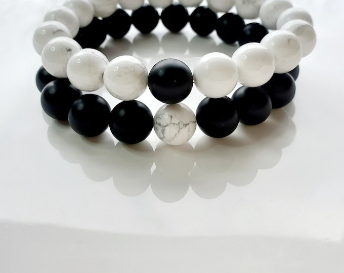 Black onyx and white how lite couples' bracelet set
