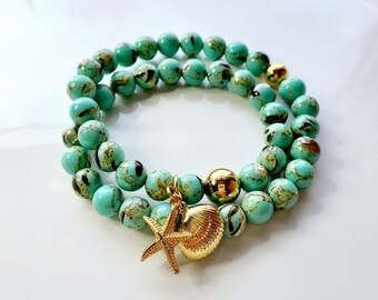 Turquoise wrap bracelet with shell inlay and gold seashore charms