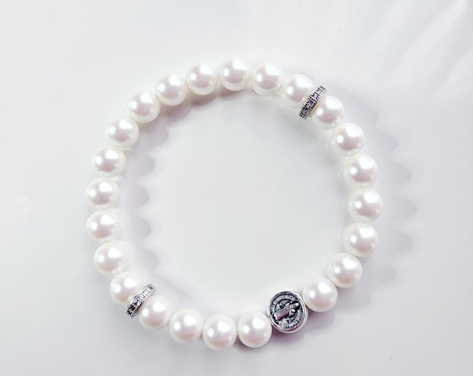 ST. BENEDICT, The Patron Saint of protection against evil and deseases with pearlescent white pearls and charm.