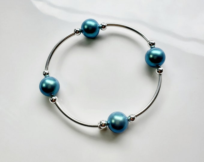 Truly Blessed, count those blessings bracelet with pearlescent blue pearls and sterling silver charm