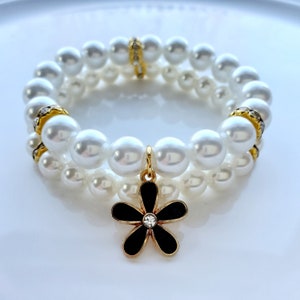 Austrian crystal pearl bracelet set with black and gold flower charm