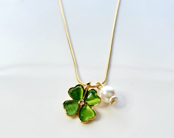 Green 4 leaf clover and pearl necklace on gold plated snake chain