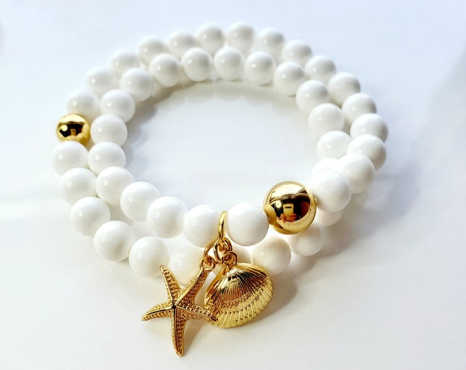 White shell wrap bracelet with gold seashore charms