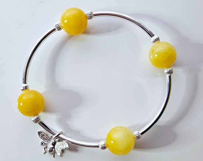 Sweet as a bee bracelet yellow jade gemstone beads, sterling silver beads and bumblebee charm.