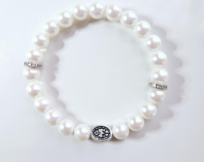 Virgin Mary bracelet with pearlescent white crystal pearls, sterling silver rhinestone beads and antique silver Virgin Mary charm.