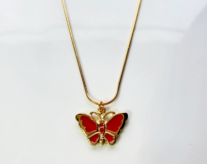 Gold plated red enamel butterfly necklace on gold plated snake chain