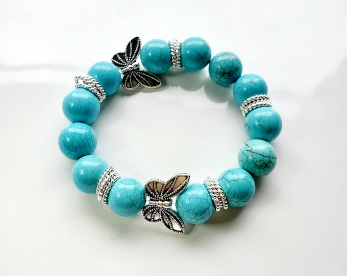 Silver plated butterfly and turquoise bead bracelet