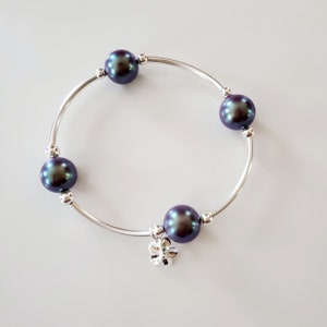 Sterling silver counts your blessings bracelet with violet crystal pearls and silver flower