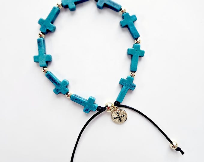 TURQUOISE CROSS  bracelet with 18kt gold and black cross charm.