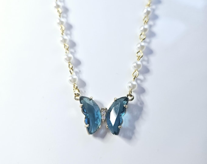 Blue sapphire butterfly necklace on rosary bead chain