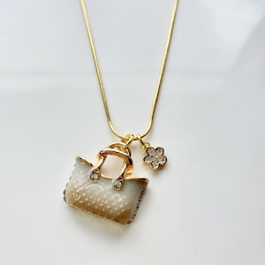 Taupe color handbag necklace on gold plated snake chain
