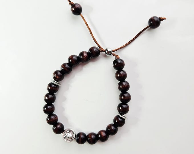 PADRE PIO bracelet the Patron saint who guides young people.  Made with dark brown 8mm wooden beads, silver rondelle beads and silver charm.