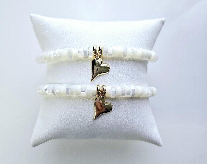 Mother daughter bracelet with white mother of pearl heishi beads and 14kt gold filled heart charm.