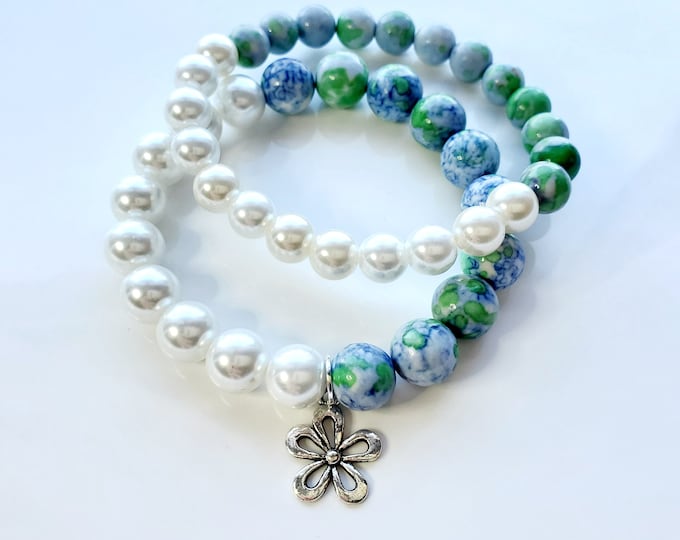 Glass and pearl bead bracelet set with silver flower charm