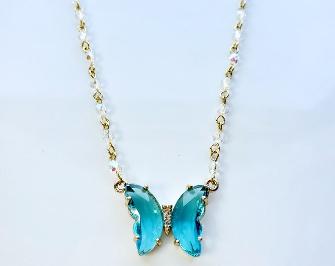 Aqua Blue butterfly pendant on crystal rosary bead chain