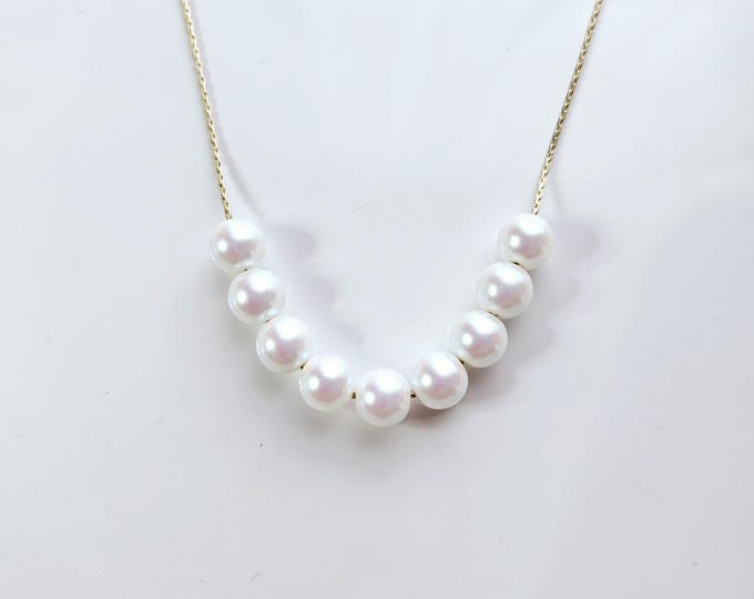 Truly Blessed Austrian crystal pearlescent white pearl necklace on 18kt gold filled chain with lobster clasp