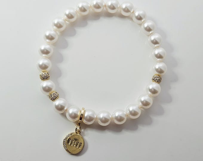 Angel 11:11 bracelet with crystal white pearls, gold pave crystal beads and gold-filled Angel charm.
