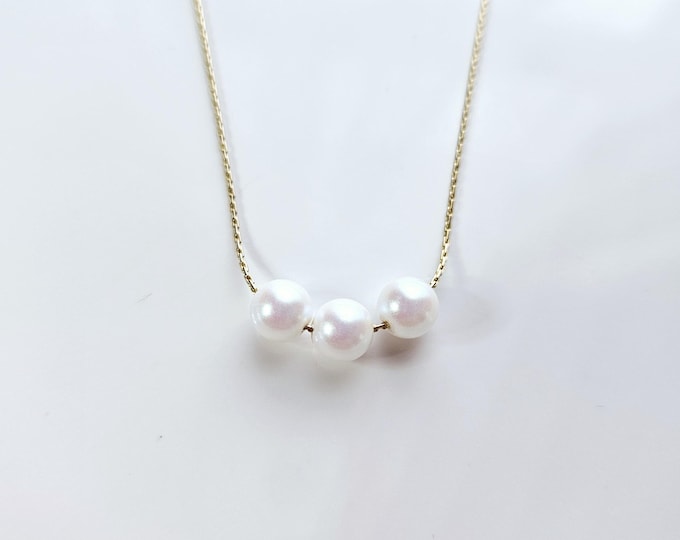 Truly Blessed Austrian crystal pearlescent white pearl necklace on 18kt gold filled chain with lobster clasp