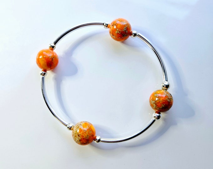 Truly blessed, count your blessings bracelet with orange sea sediment imperial jasper beads.