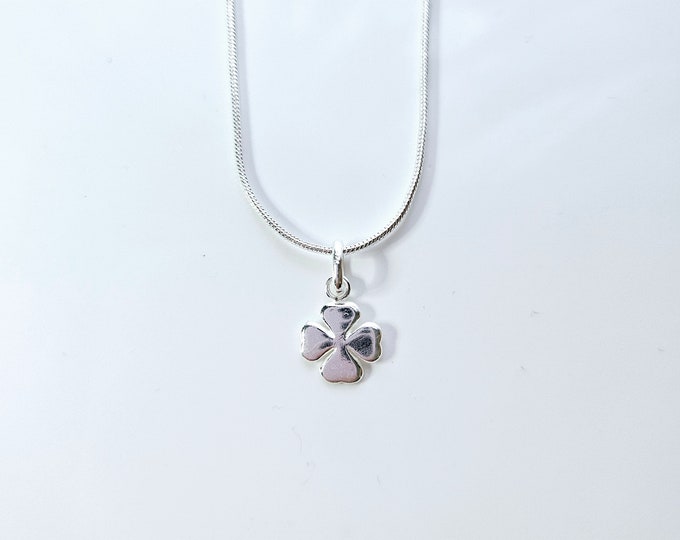 sterling silver snake chain necklace with four leaf clover charm pendant.