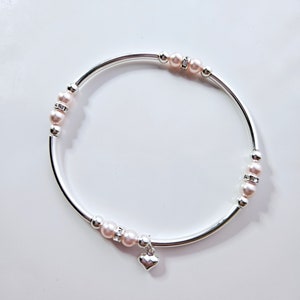 Truly Blessed tel je zegeningen-armband met Oostenrijkse kristallen rosalineparels en zilveren hartbedel