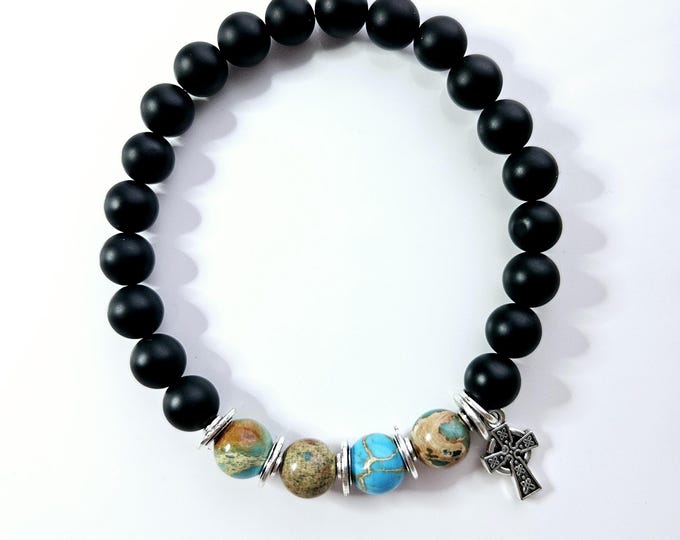 Black onyx and turquoise jasper bead bracelet with Celtic cross charm.
