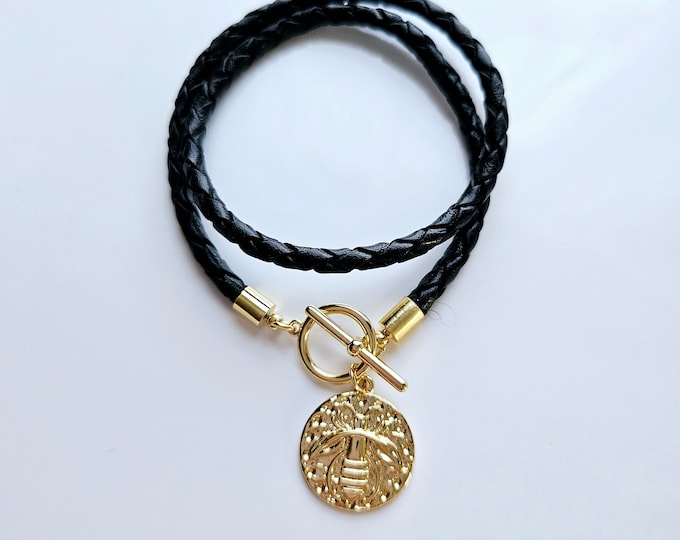 Gold queen bee leather wrap charm bracelet with gold toggle clasp