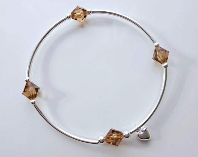 Truly Blessed, count your blessings bracelet with topaz birthstone and silver heart charm for November birthday.