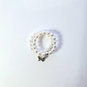 Austrian crystal white pearl stackable beaded ring with sterling silver Butterfly charm.