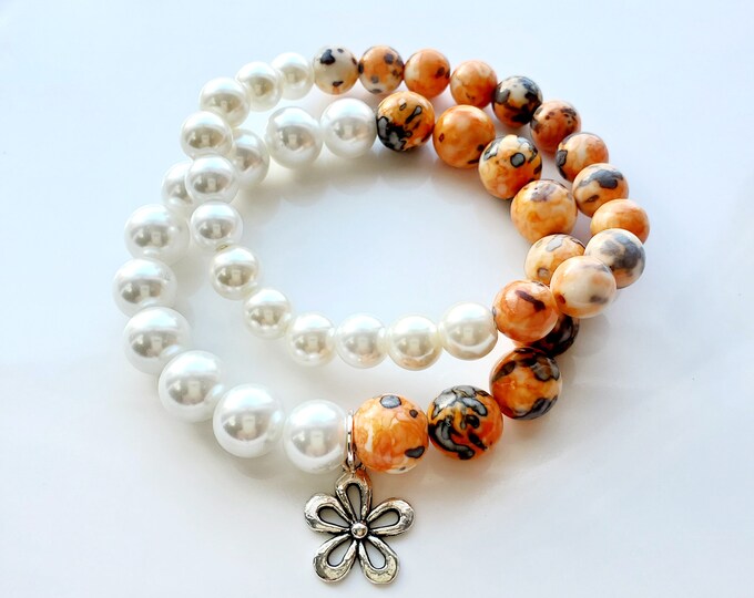 Glass bead and pearl bracelet set with silver flower charm