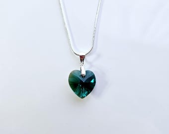 Sterling silver Austrian crystal emerald green AB heart pendant on snake chain.