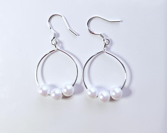 Sterling silver 1.0 inch hoop earrings with pearlescent white pearls and earrings wire