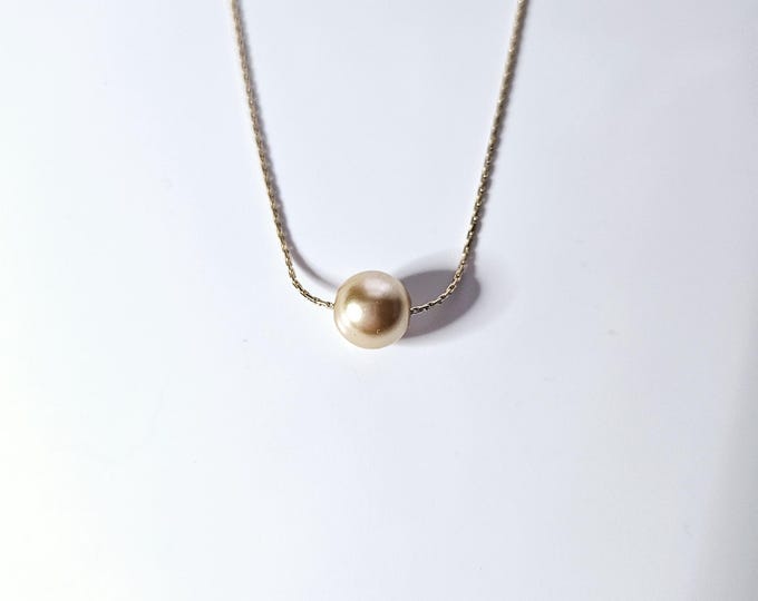 Truly Blessed squeeze the pearl necklace with 14kt gold filled dainty snake chain, gold crystal pearl and lobster clasp.