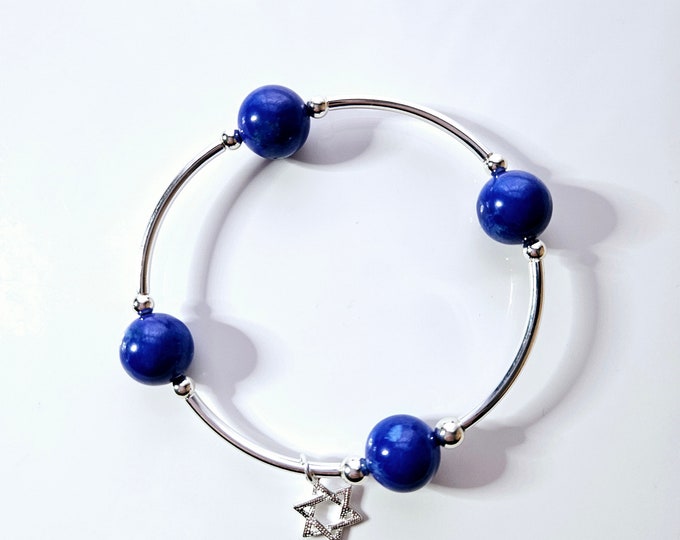 Sterling silver truly blessed bracelet with blue lapis beads and silver Star of David charm.