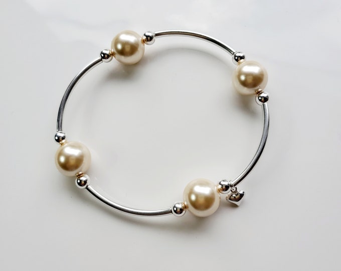 Sterling silver Truly blessed bracelet with gold pearl beads and heart charm and blessings.