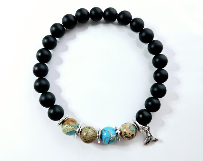 Mens Celtic Blessing bracelet with black onyx beads and silver trinity knot.
